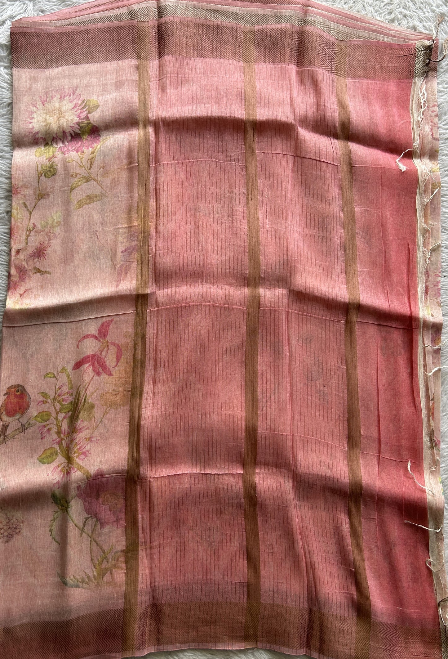 Pure Linen Saree Pink Colored Complemented with a Zari Border. - Sampradaya Designer Studio