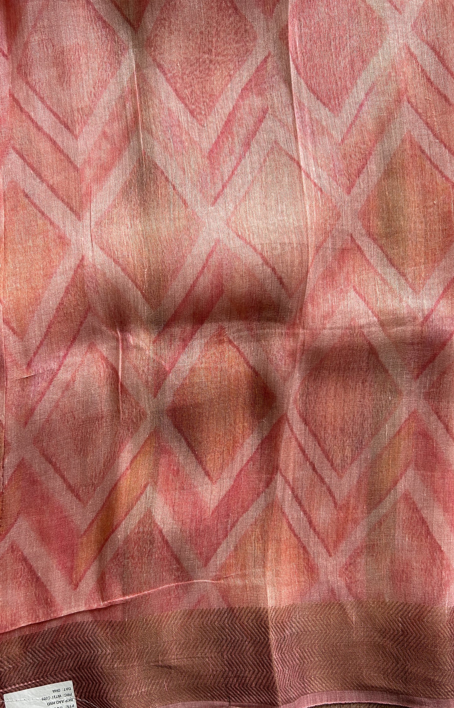 Pure Linen Saree Pink Colored Complemented with a Zari Border. - Sampradaya Designer Studio