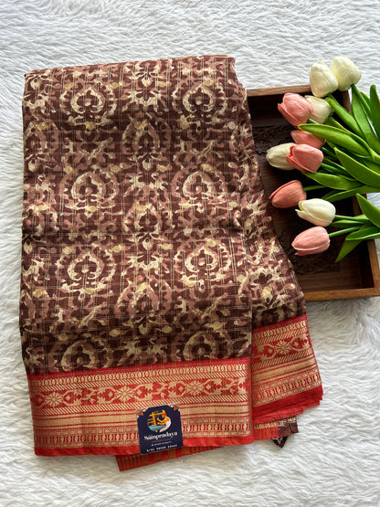 Dola Crepe Saree Brown Colored Complemented with a Red Color Zari Border. - Sampradaya Designer Studio