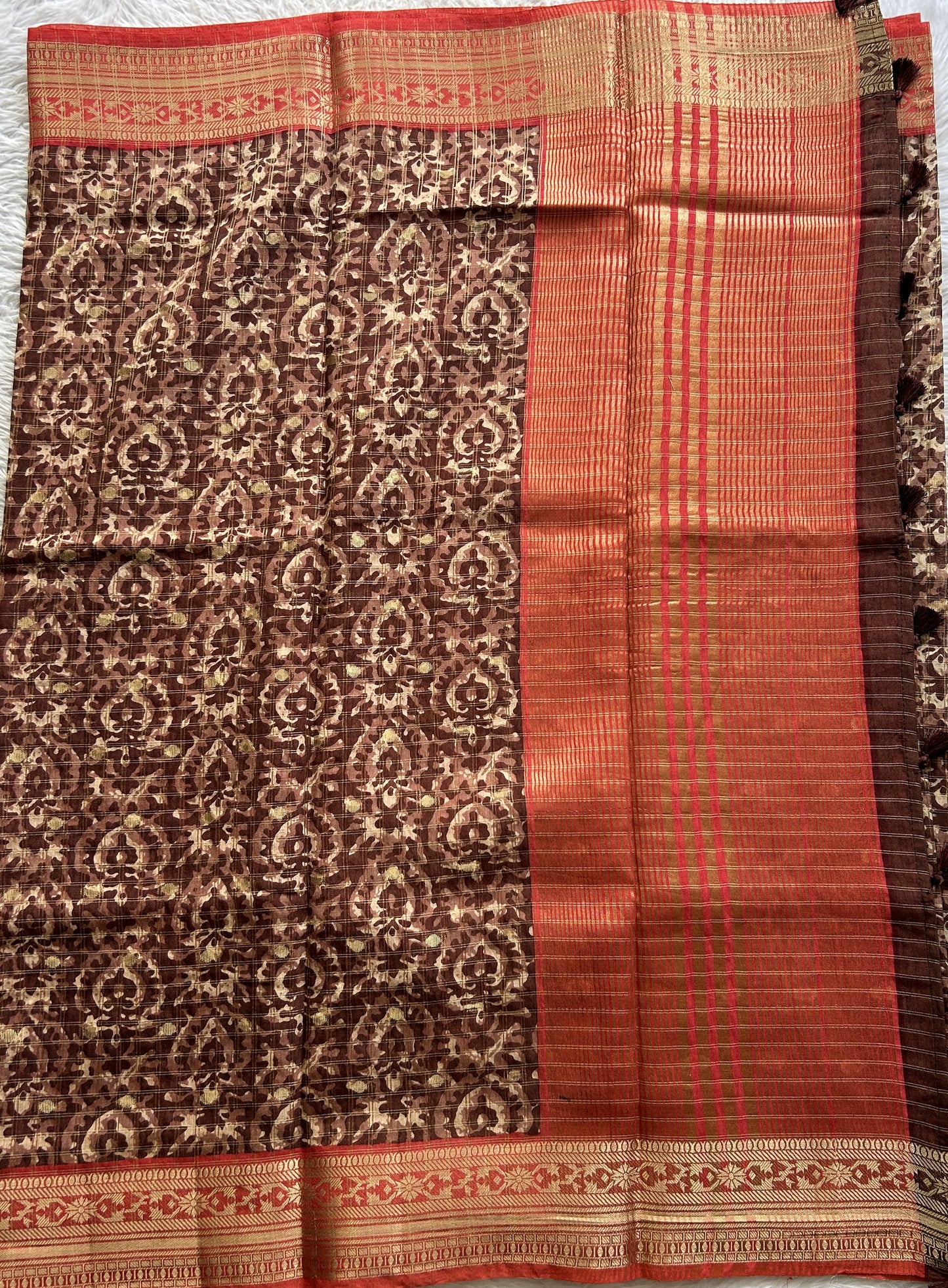 Dola Crepe Saree Brown Colored Complemented with a Red Color Zari Border. - Sampradaya Designer Studio