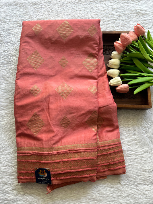 Semi Georgette Saree Dark Peach Colored Complemented with a Zari Border. - Sampradaya Designer Studio