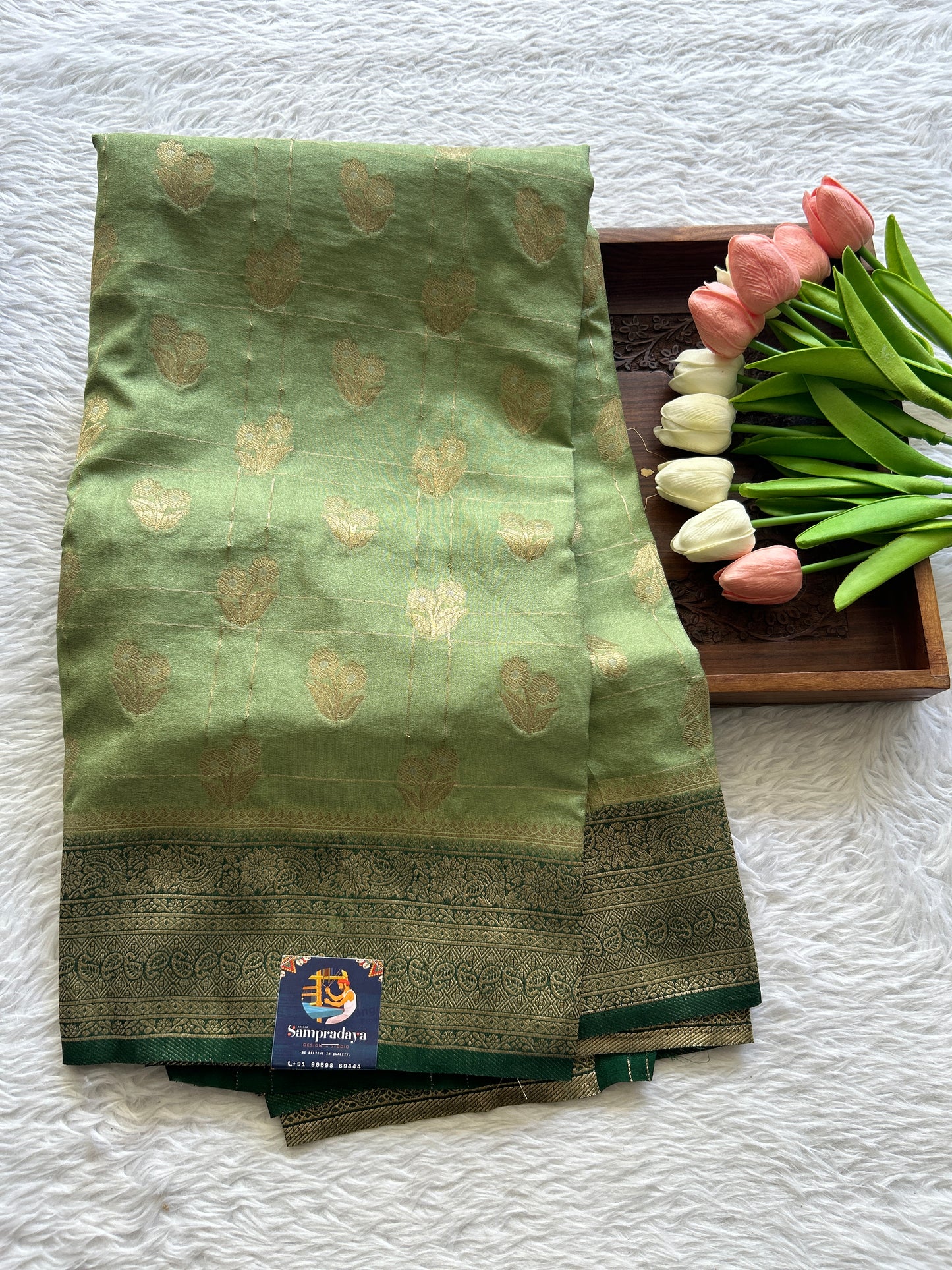 Semi Georgette Saree Light Green Colored Complemented with a Zari Border. - Sampradaya Designer Studio