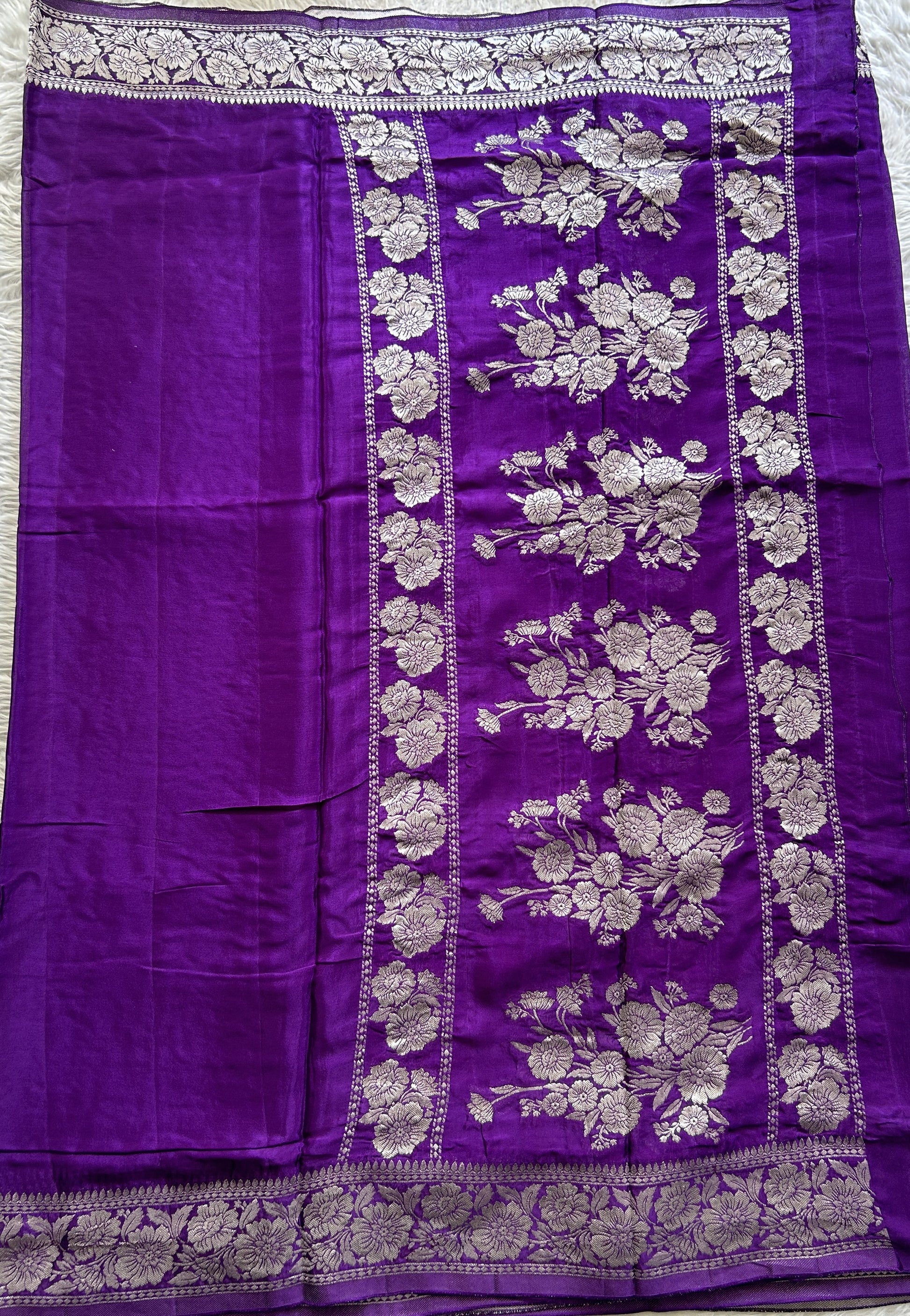 Viscose Georgette Saree Violet Colored Complemented with a Zari Border. - Sampradaya Designer Studio