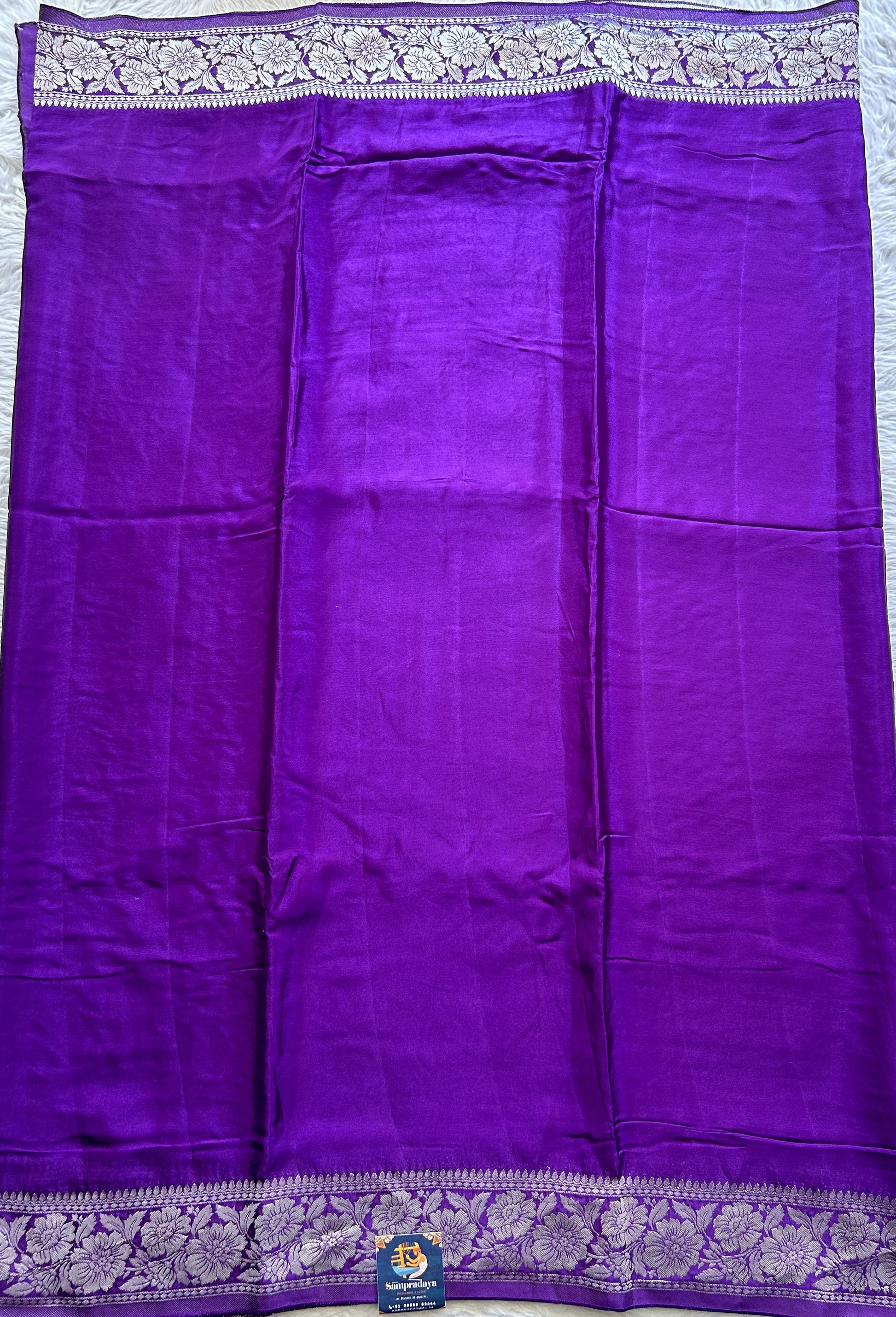 Viscose Georgette Saree Violet Colored Complemented with a Zari Border. - Sampradaya Designer Studio