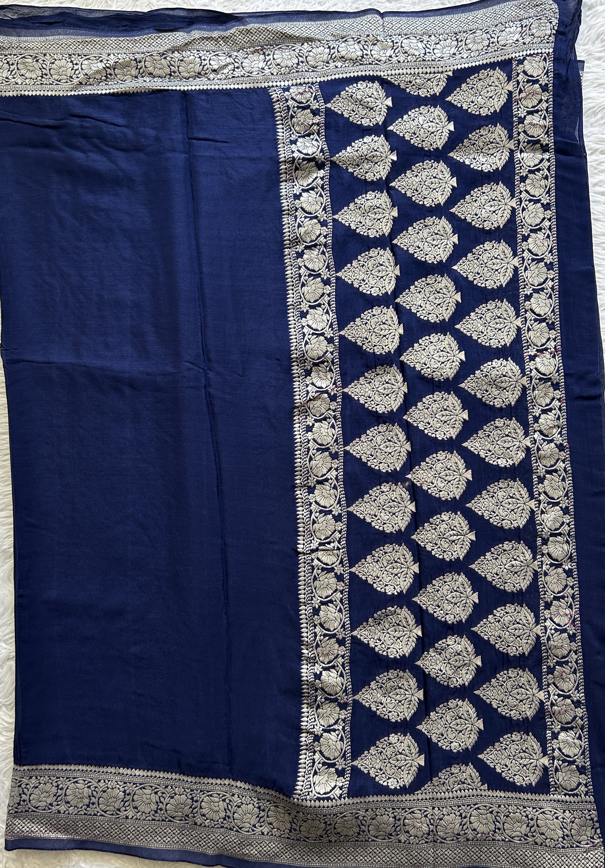 Viscose Georgette Saree Navy Blue Colored Complemented with a Zari Border. - Sampradaya Designer Studio