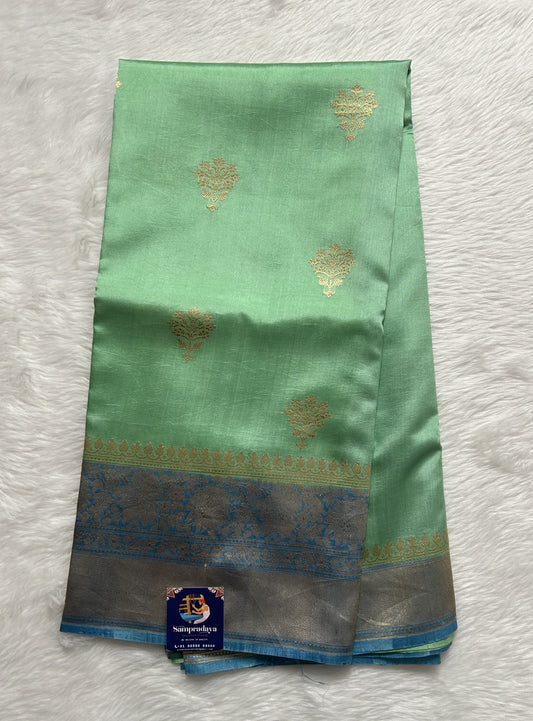 Raw Mango or Pooniya Silk Saree Mint Green Colored Complemented With a Turquoise blue Gold Zari Border - Sampradaya Designer Studio