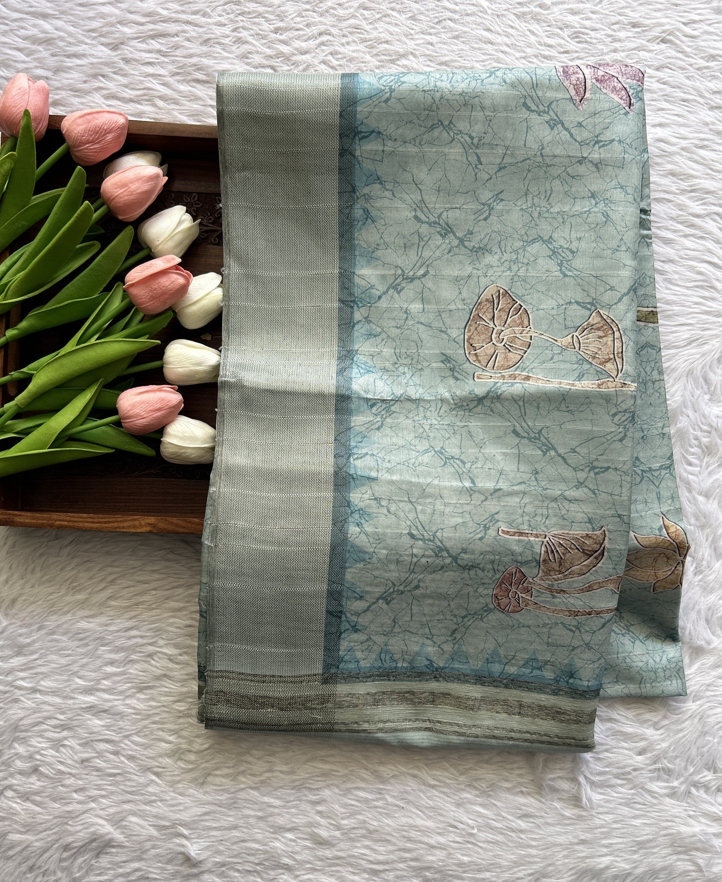 Semi Tussar Saree Light Blue Colored complemented with a Zari Border. - Sampradaya Designer Studio