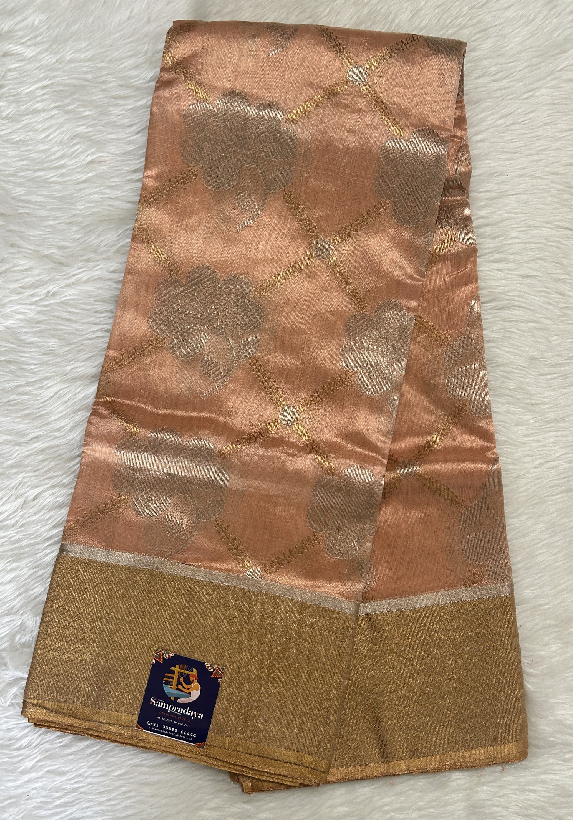 Chanderi Pattu Saree Pastel Orange colored saree complemented with Gold Zari Weaving Kanchi border - Sampradaya Designer Studio