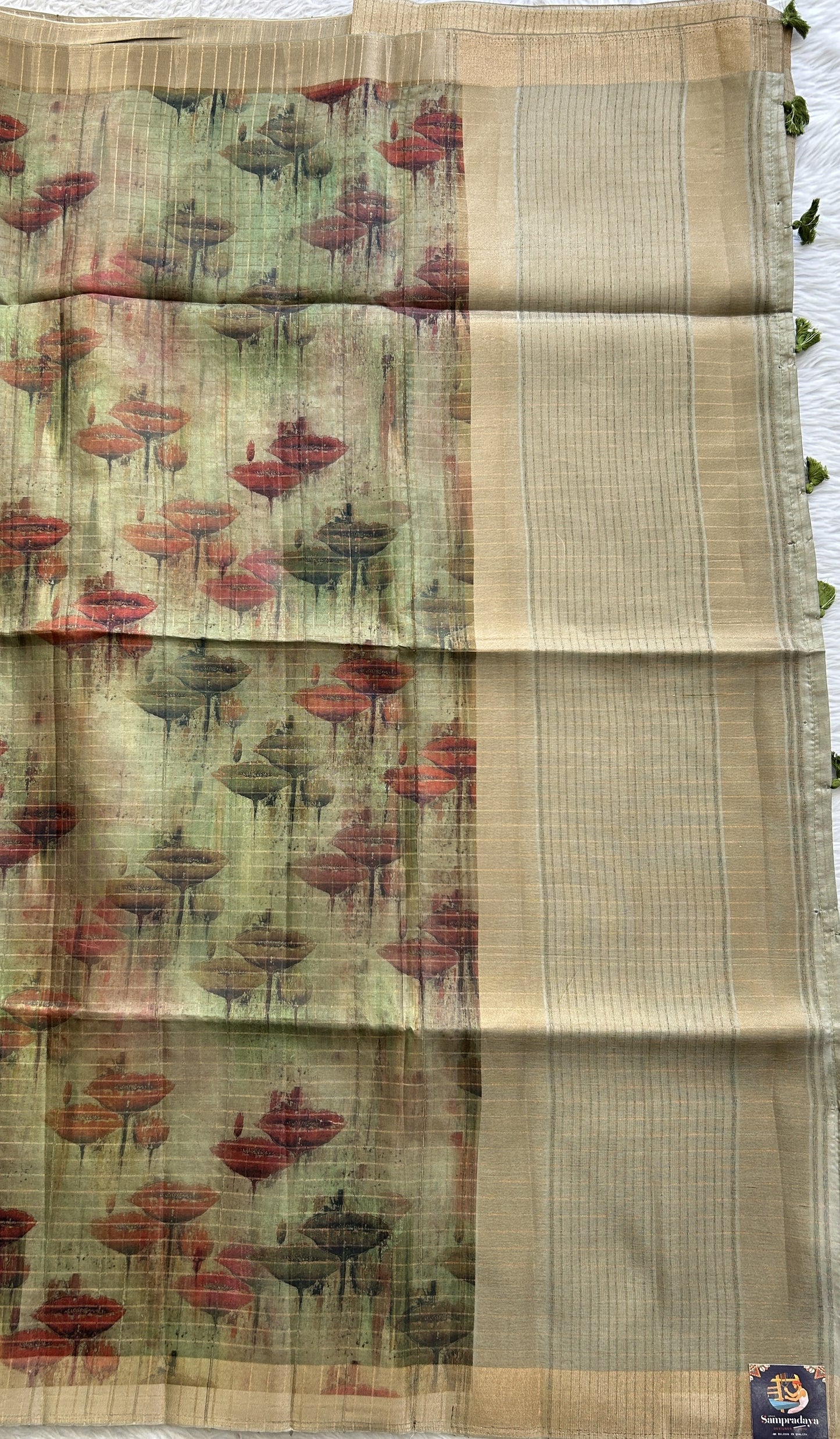 Semi Tussar Saree Olive Green Colored complemented with a Zari Border. - Sampradaya Designer Studio