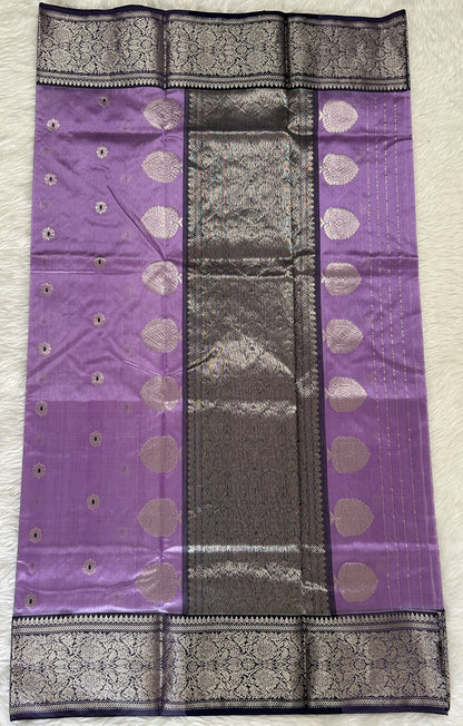 Chanderi Pattu Saree Purple colored saree complemented with a Light purple Kanchi border - Sampradaya Designer Studio