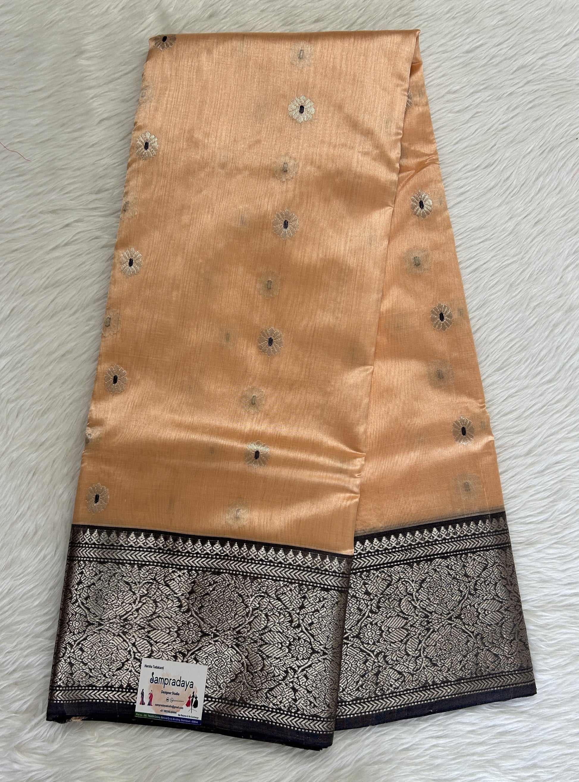 Chanderi Pattu Saree Pastel Orange colored saree complemented with a Dark Grey Color Kanchi Border - Sampradaya Designer Studio