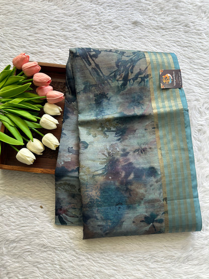 Semi Tussar Saree Gray Colored complemented with a Sea Blue Zari Border. - Sampradaya Designer Studio