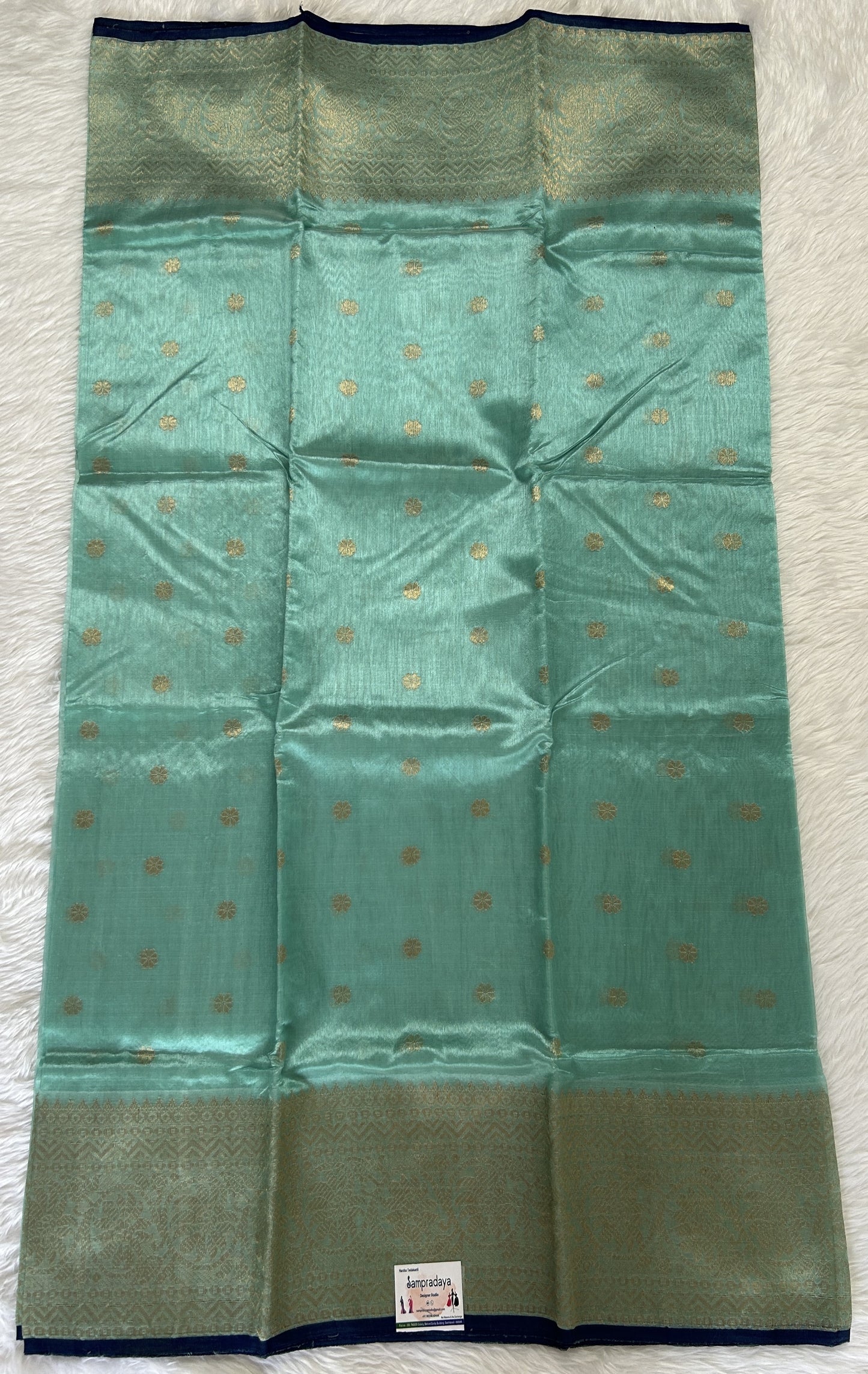 Chanderi Pattu Saree Cyan colored saree complemented with a Kanchi border - Sampradaya Designer Studio