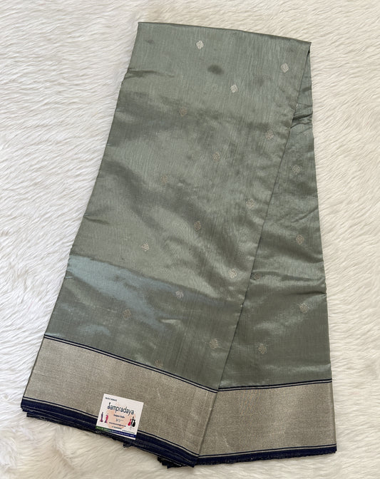 Chanderi Pattu Saree Greenish Grey colored saree complemented with a Silver Zari Border - Sampradaya Designer Studio