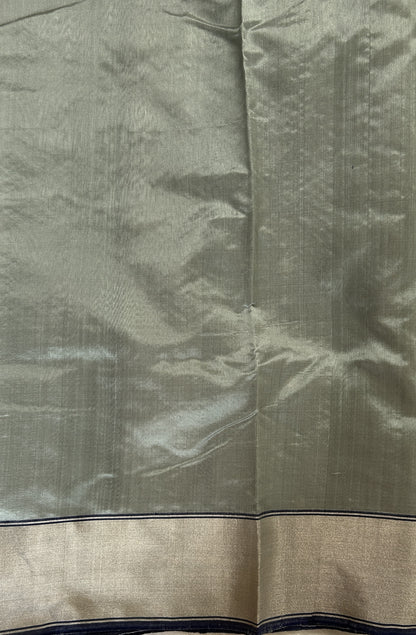 Chanderi Pattu Saree Greenish Grey colored saree complemented with a Silver Zari Border - Sampradaya Designer Studio