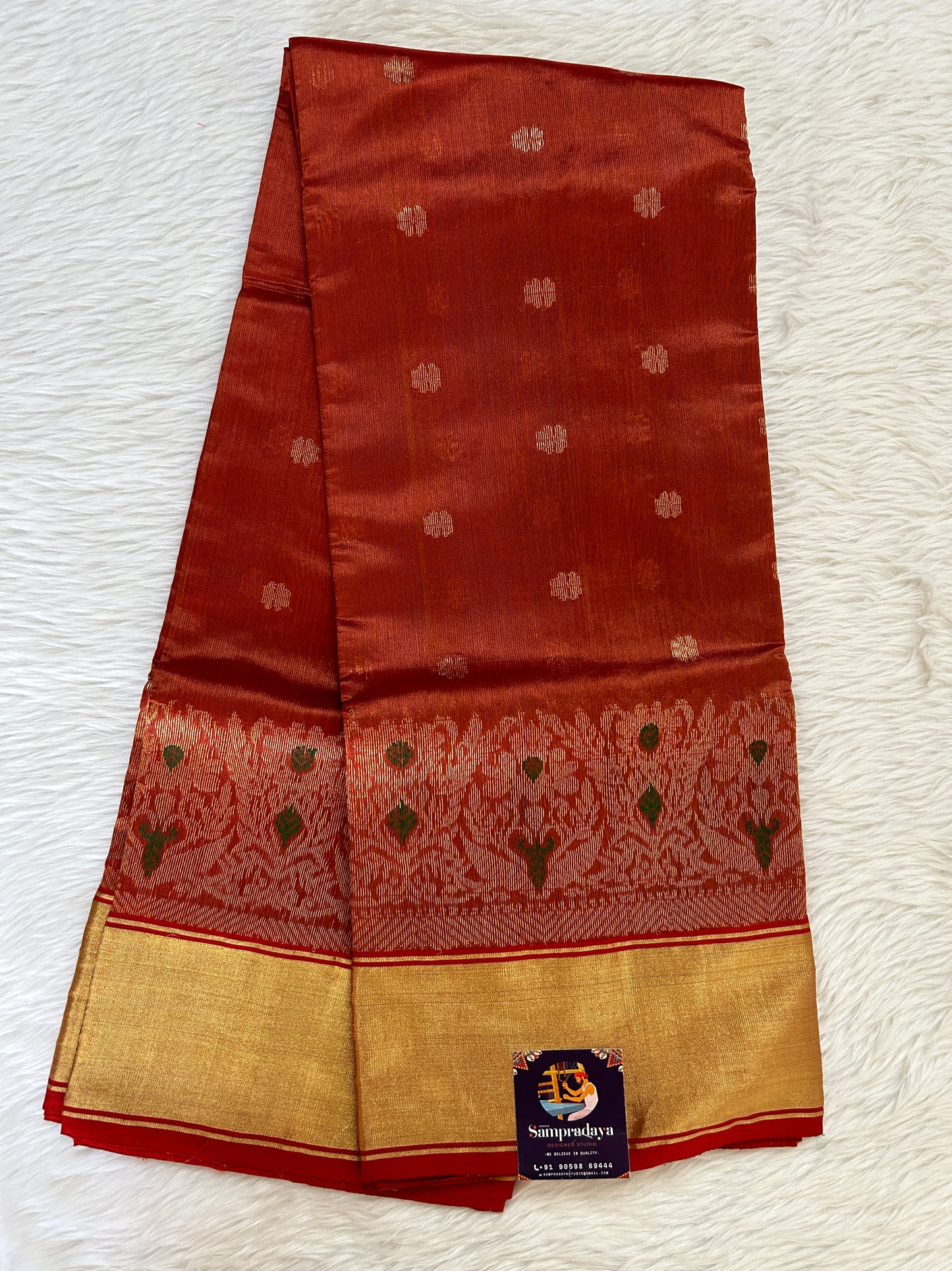 Chanderi Pattu Saree Copper colored saree complemented with a Gold Zari Border - Sampradaya Designer Studio