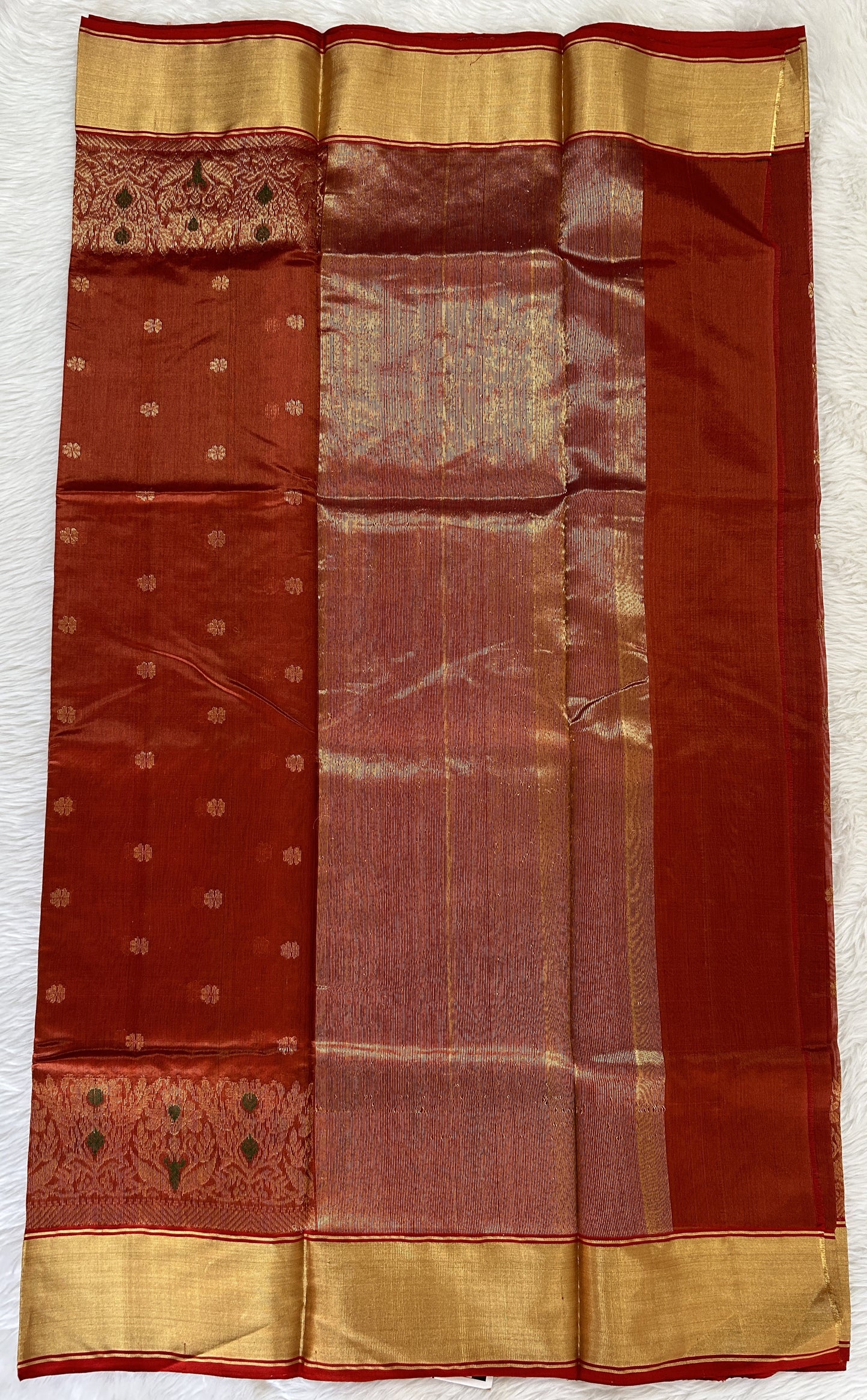 Chanderi Pattu Saree Copper colored saree complemented with a Gold Zari Border - Sampradaya Designer Studio