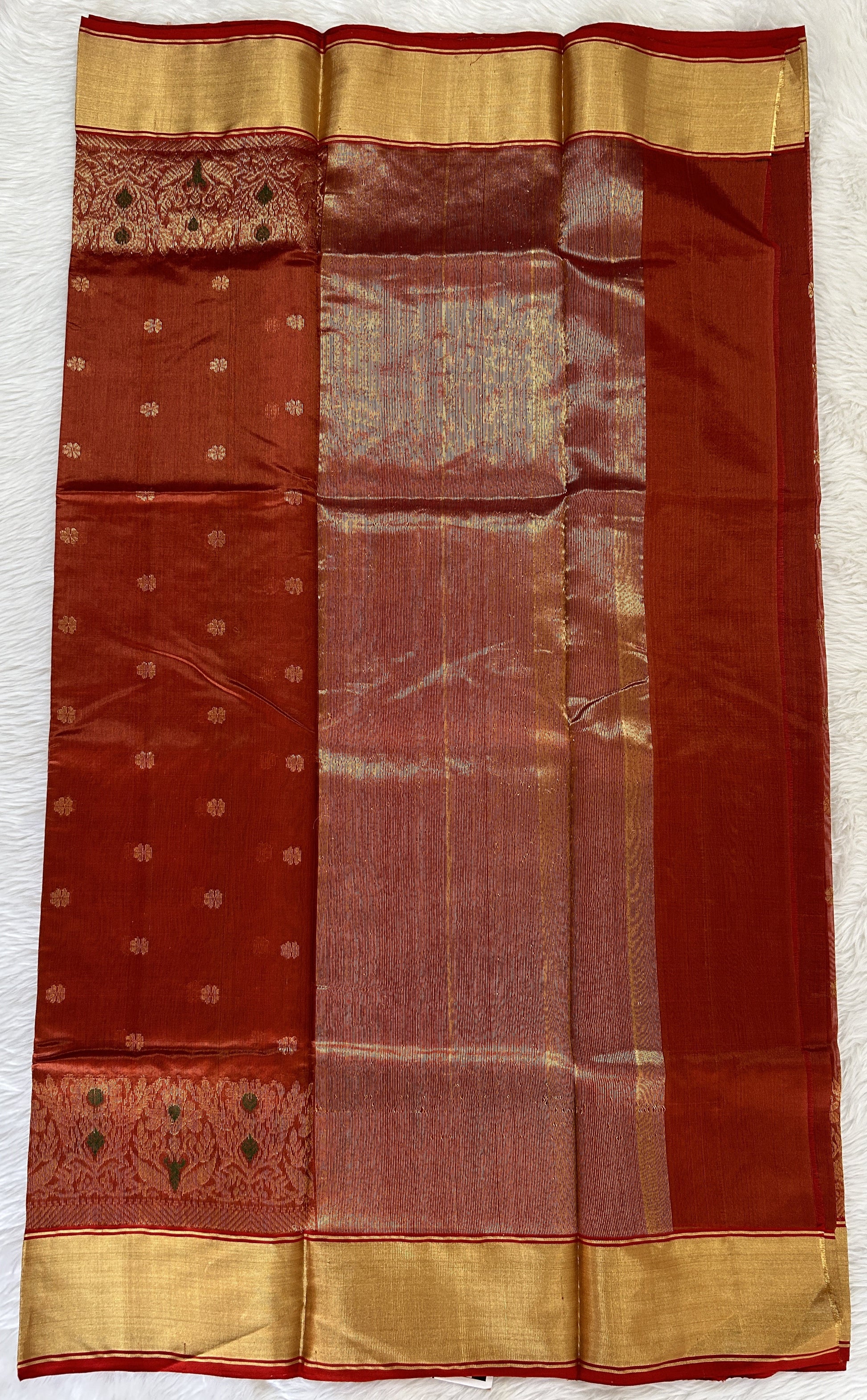 Chanderi Pattu Saree Copper colored saree complemented with a Gold Zari Border - Sampradaya Designer Studio