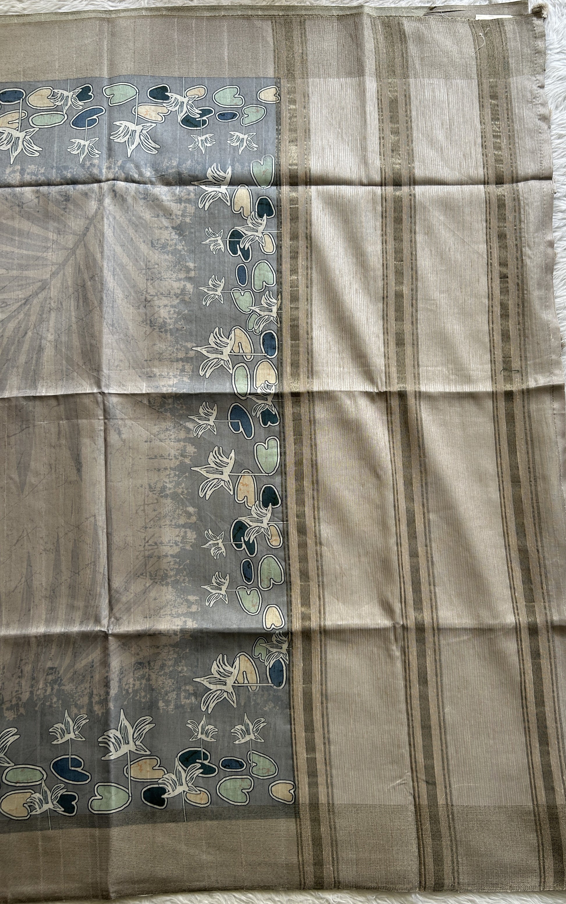 Semi Tussar Saree Gray Colored complemented with a Zari Border. - Sampradaya Designer Studio