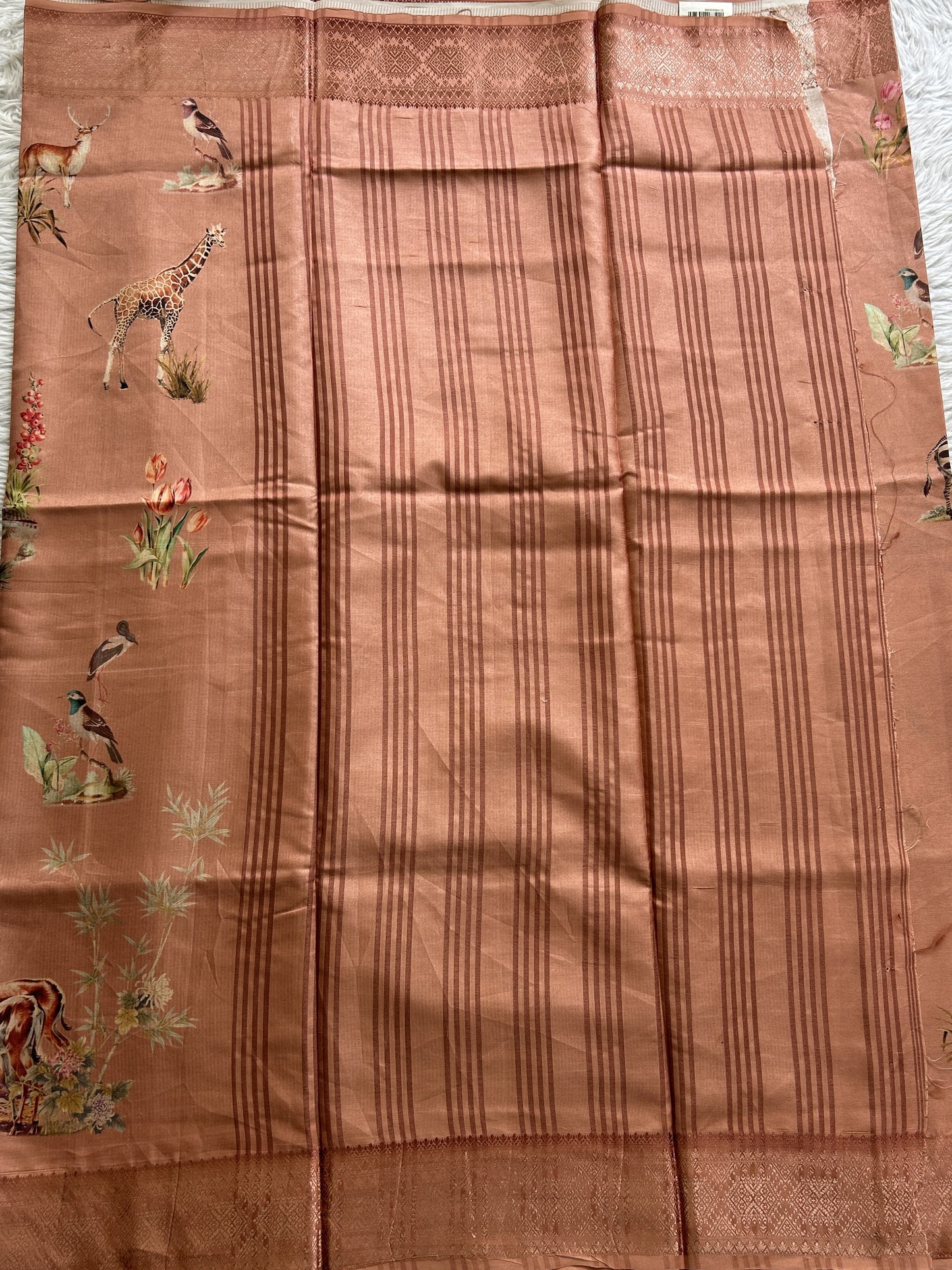 Semi Raw Silk Saree Light Orange Colored Complemented with a Zari Border. - Sampradaya Designer Studio