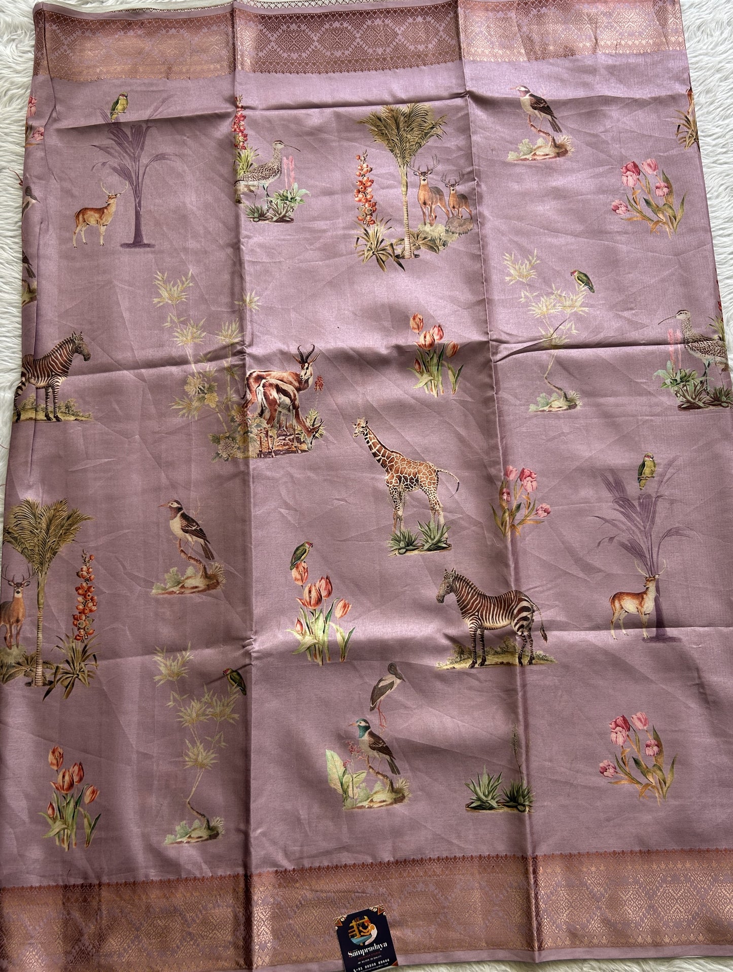 Semi Raw Silk Saree Lilac Colored Complemented with a Zari Border. - Sampradaya Designer Studio