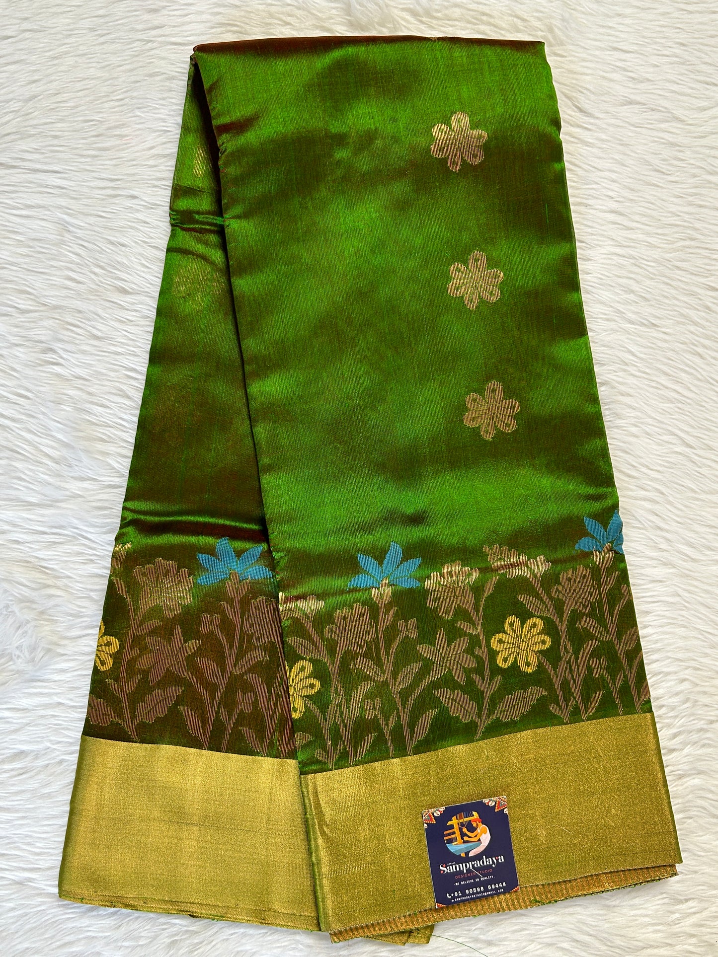 Chanderi Pattu Saree Dark Green colored saree complemented with a Gold Zari border - Sampradaya Designer Studio