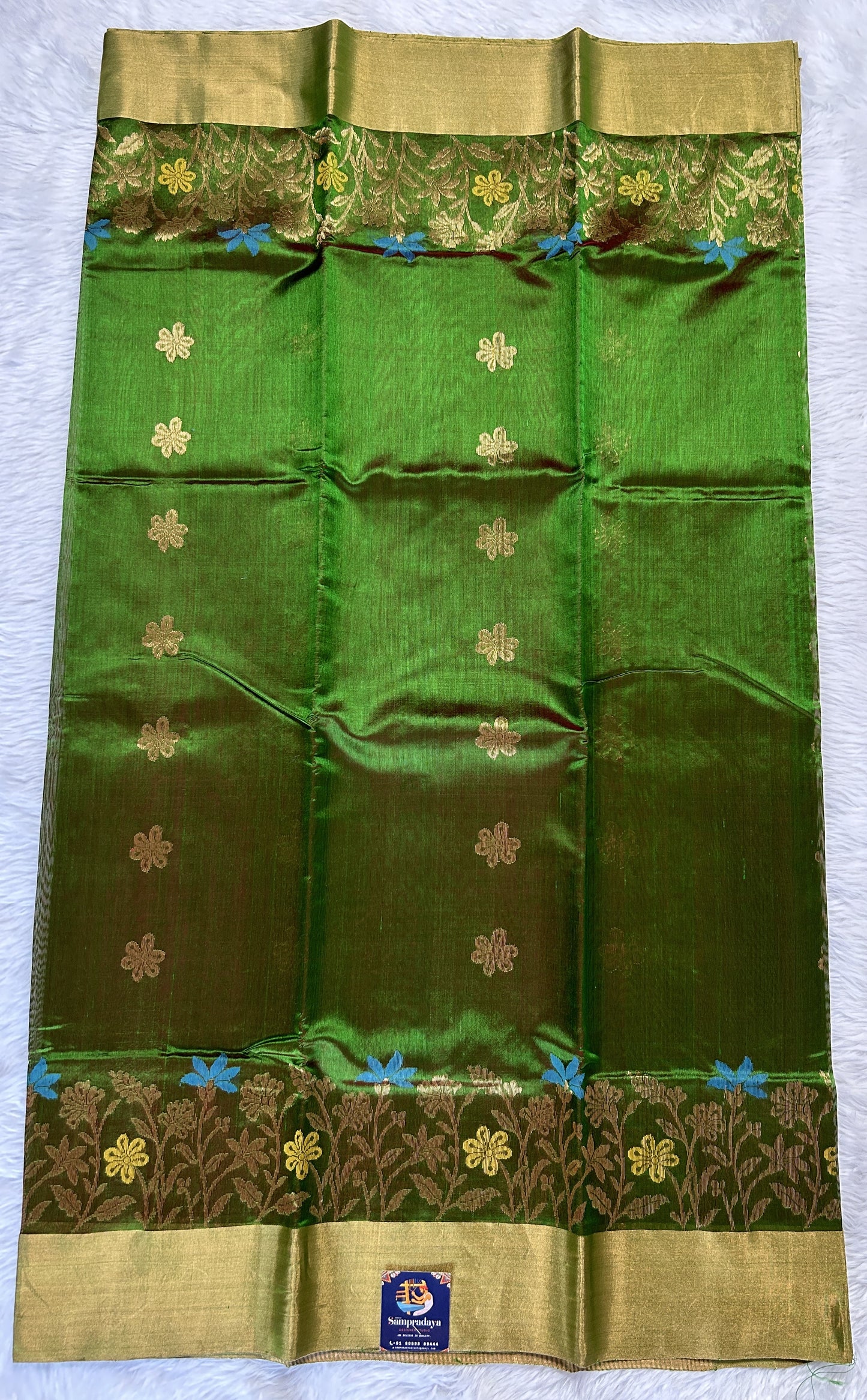 Chanderi Pattu Saree Dark Green colored saree complemented with a Gold Zari border - Sampradaya Designer Studio