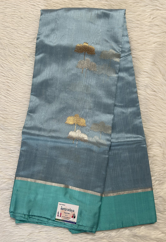 Chanderi Pattu Saree Turquoise colored saree complemented with a Mashru border - Sampradaya Designer Studio