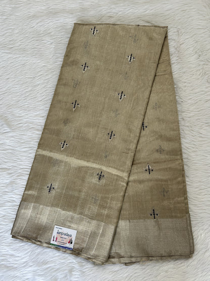 Chanderi Pattu Saree Wheat colored saree complemented with a Silver Zari border - Sampradaya Designer Studio