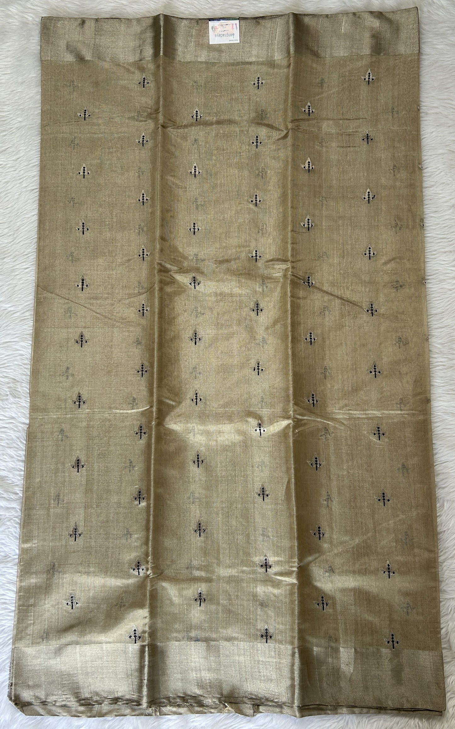 Chanderi Pattu Saree Wheat colored saree complemented with a Silver Zari border - Sampradaya Designer Studio