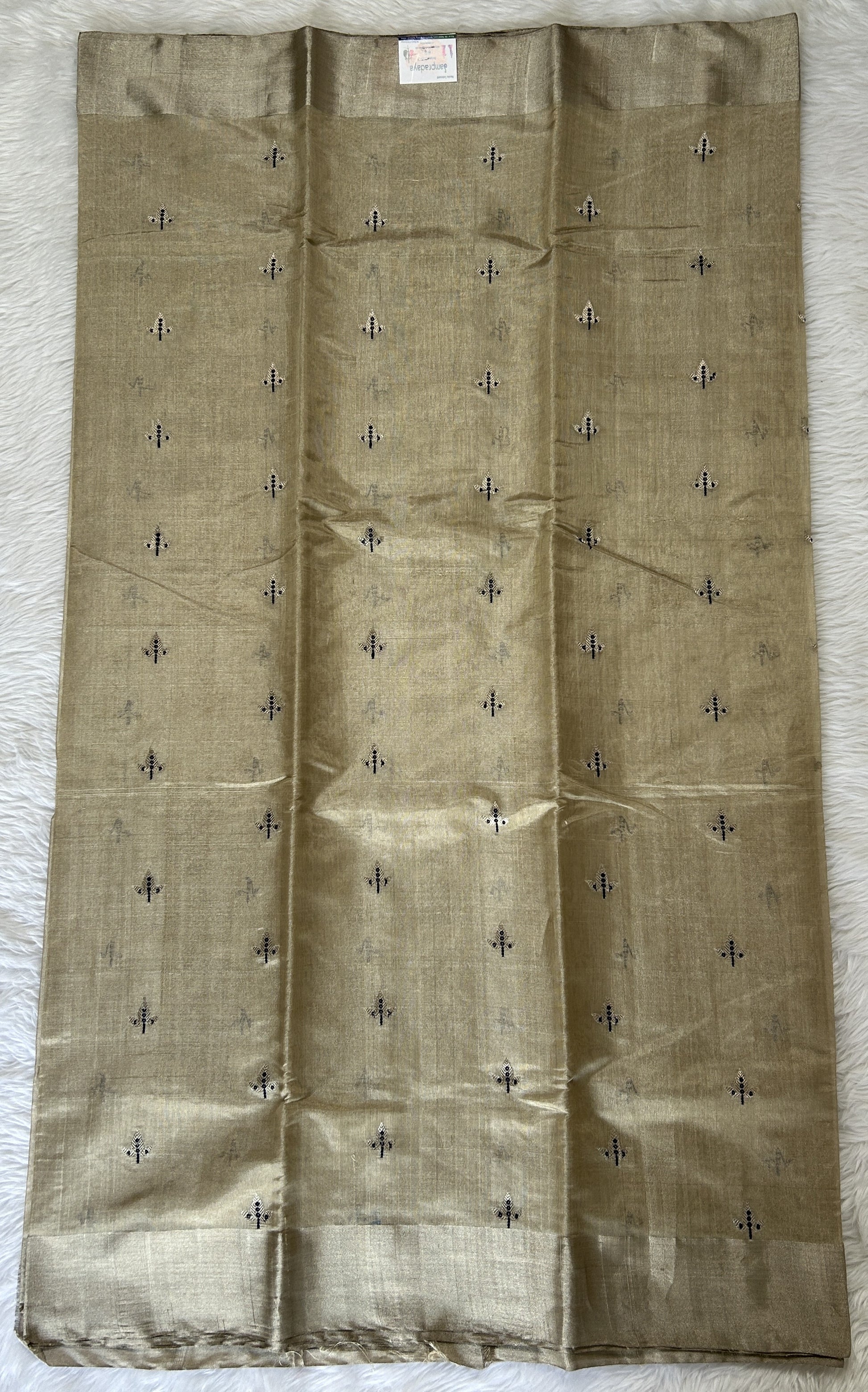 Chanderi Pattu Saree Wheat colored saree complemented with a Silver Zari border - Sampradaya Designer Studio