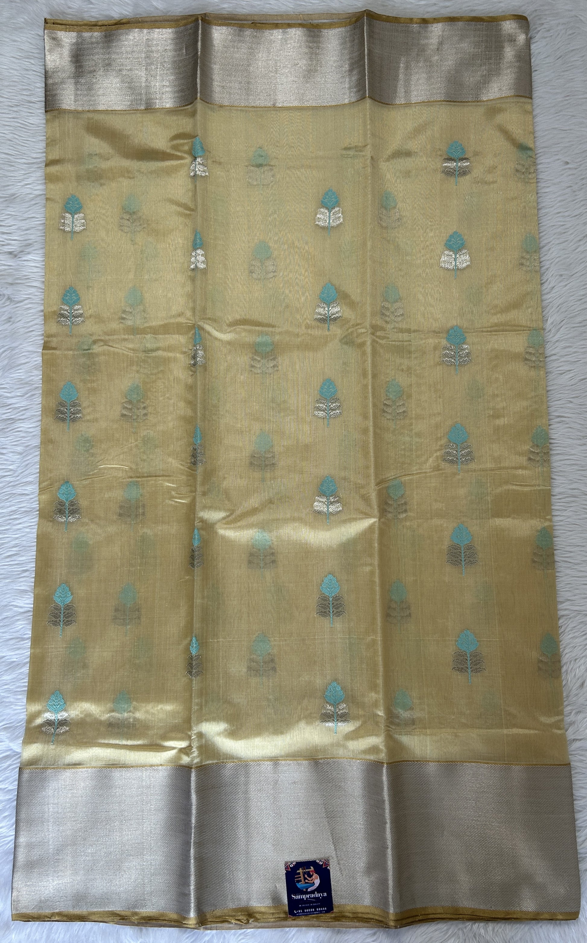 Chanderi Pattu Saree Pastel Yellow colored saree complemented with a Silver Zari Weaving border - Sampradaya Designer Studio