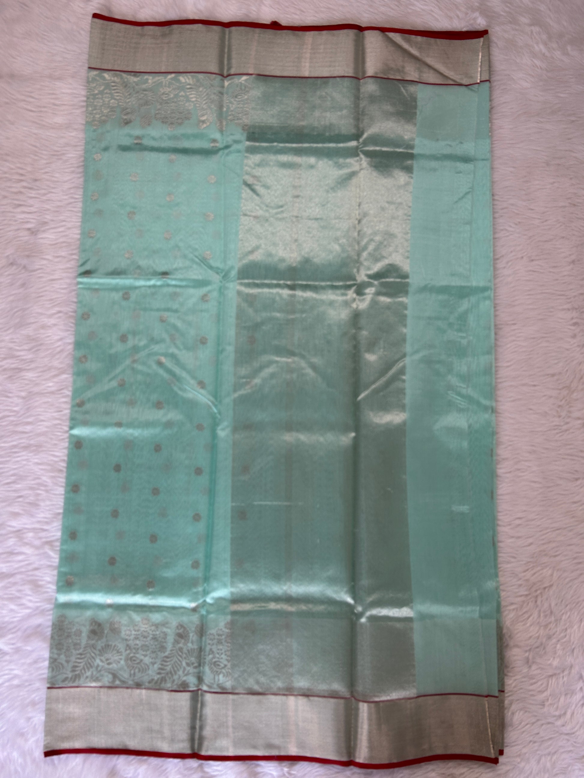 Chanderi Pattu Saree Mint Green colored saree complemented with a Silver Zari border - Sampradaya Designer Studio