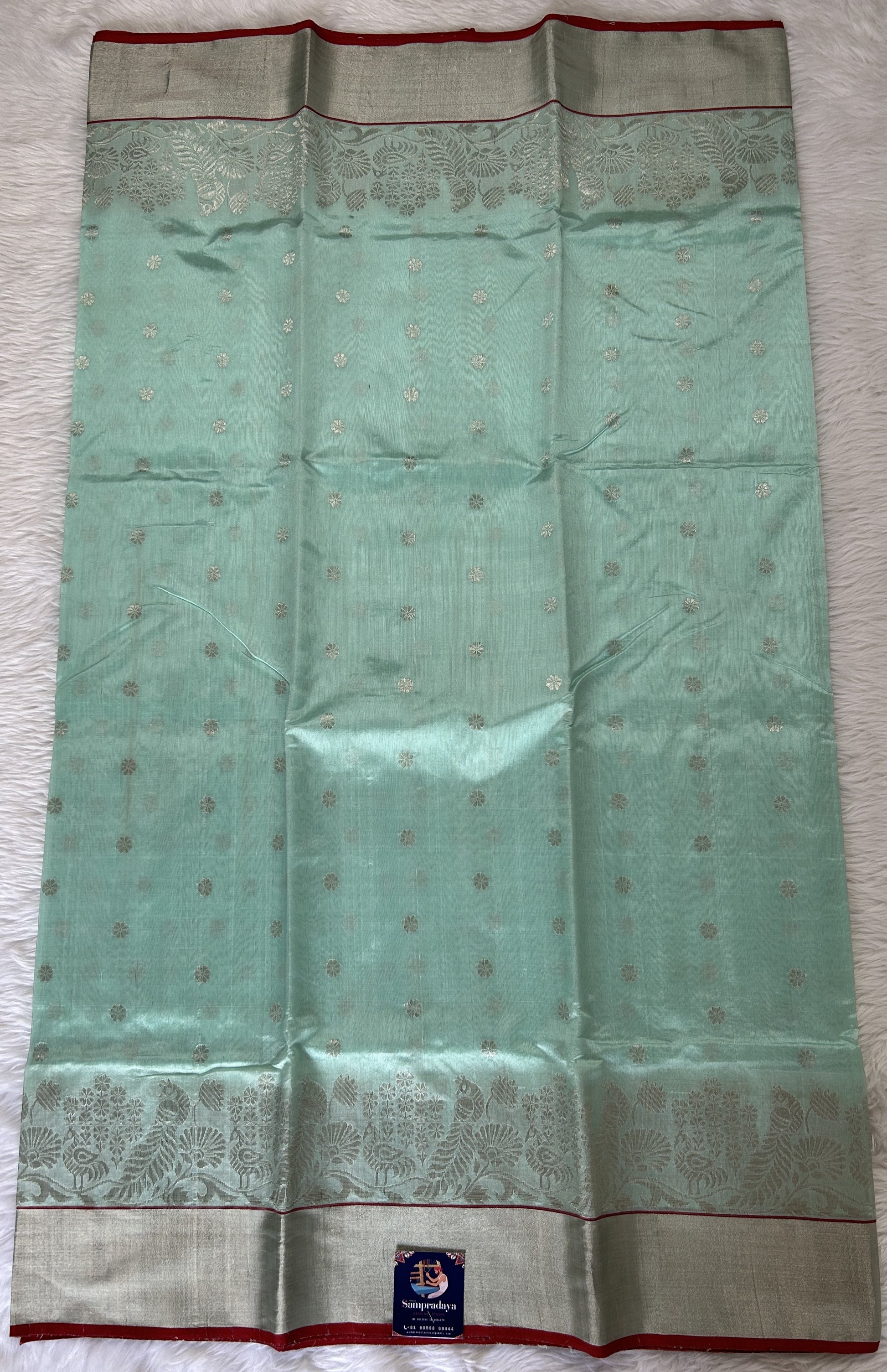 Chanderi Pattu Saree Mint Green colored saree complemented with a Silver Zari border - Sampradaya Designer Studio