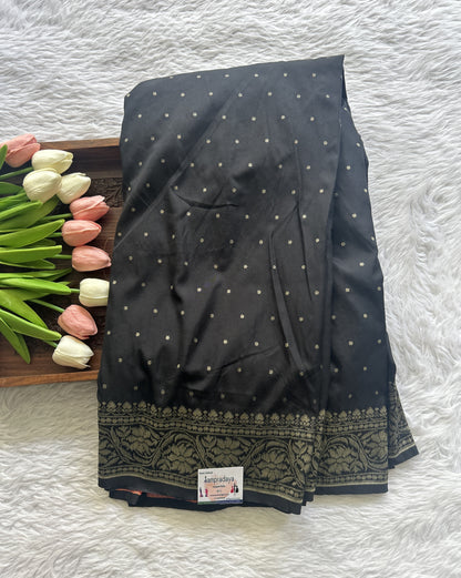 Banarasi Semi Katan Saree Black Colored Complemented with a Zari Border. - Sampradaya Designer Studio