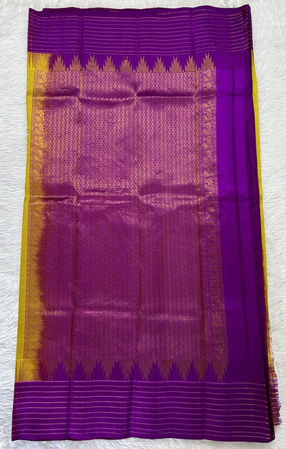 Gadwal Pattu Saree Yellow colored saree complemented with a Purple Checks Border - Sampradaya Designer Studio