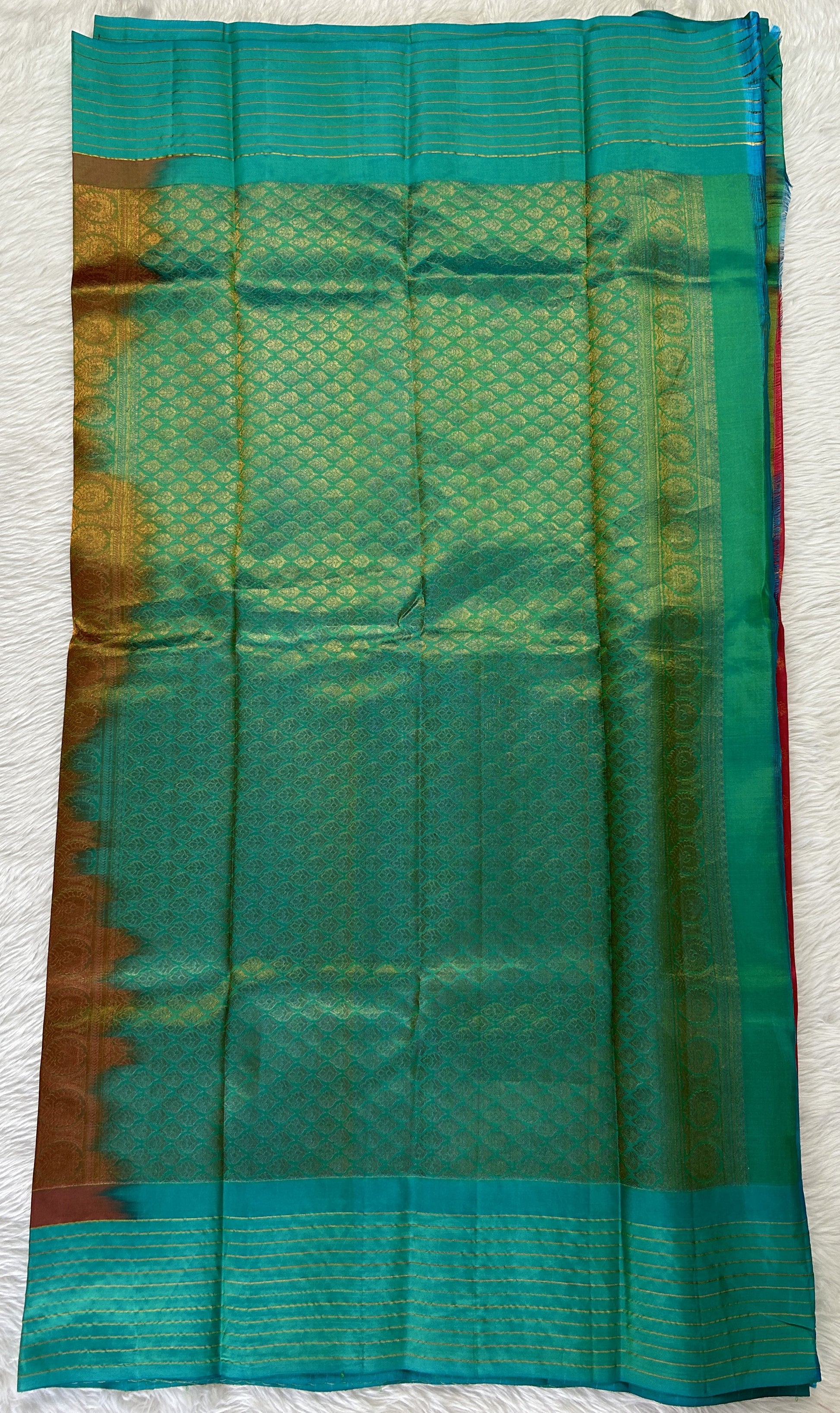 Gadwal Pattu Saree Merlot colored saree complemented with a Sea Green Checks Border - Sampradaya Designer Studio