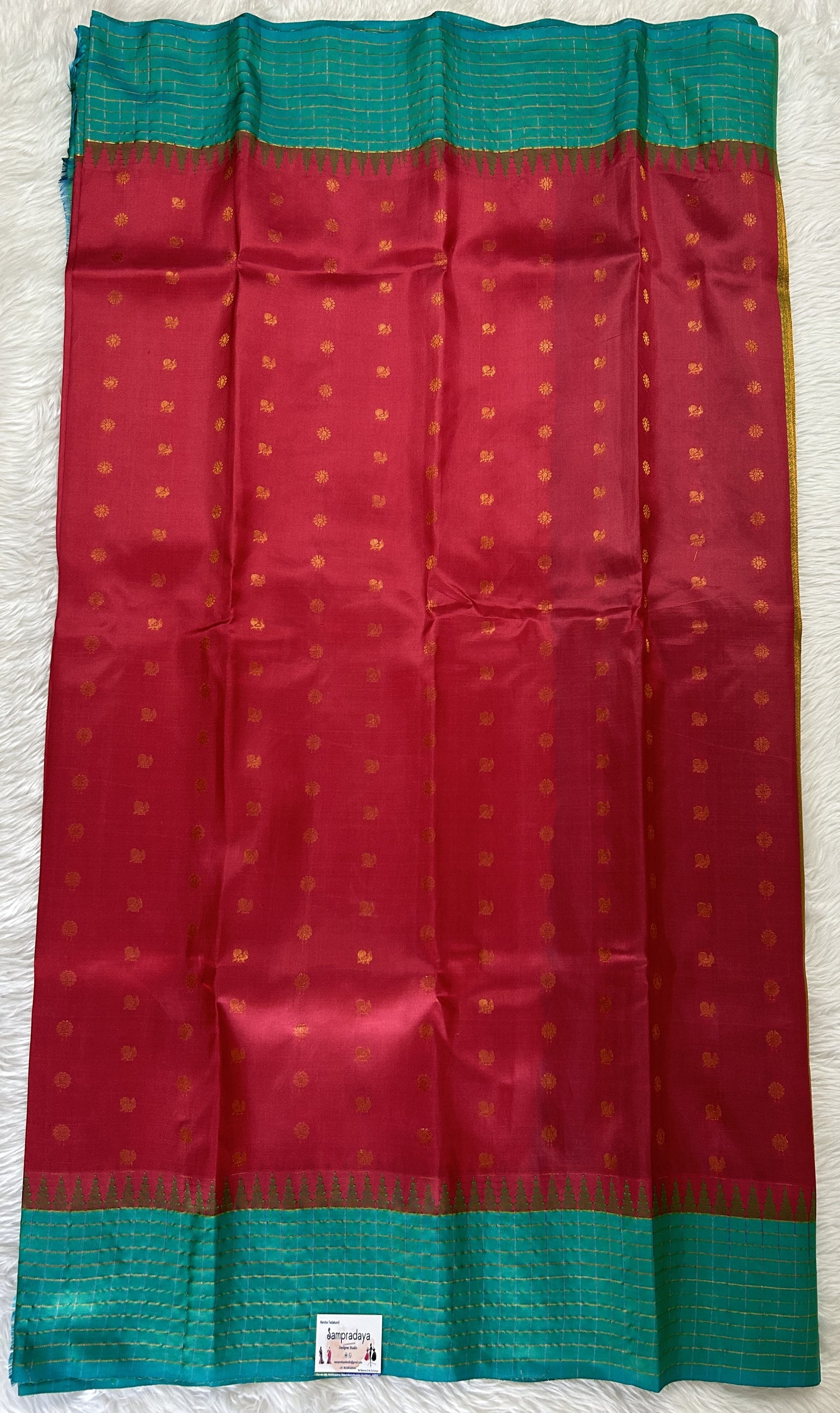 Gadwal Pattu Saree Merlot colored saree complemented with a Sea Green Checks Border - Sampradaya Designer Studio