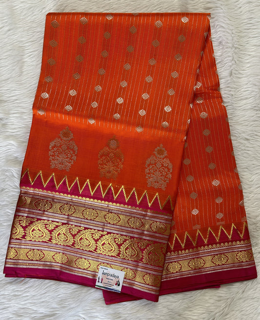 Venkatagiri Pattu Saree Orange Colored Complemented With a Pattu Pink Color Kanchi Border - Sampradaya Designer Studio