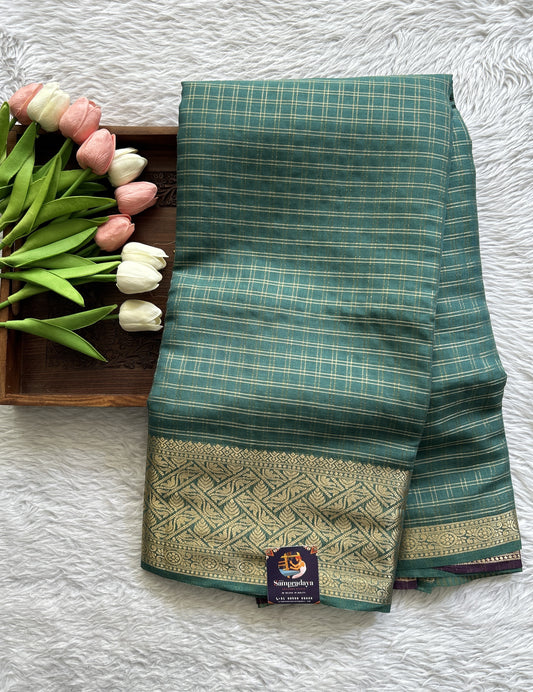 Semi Georgette Saree Sea Green Colored Complemented with a Zari Border. - Sampradaya Designer Studio