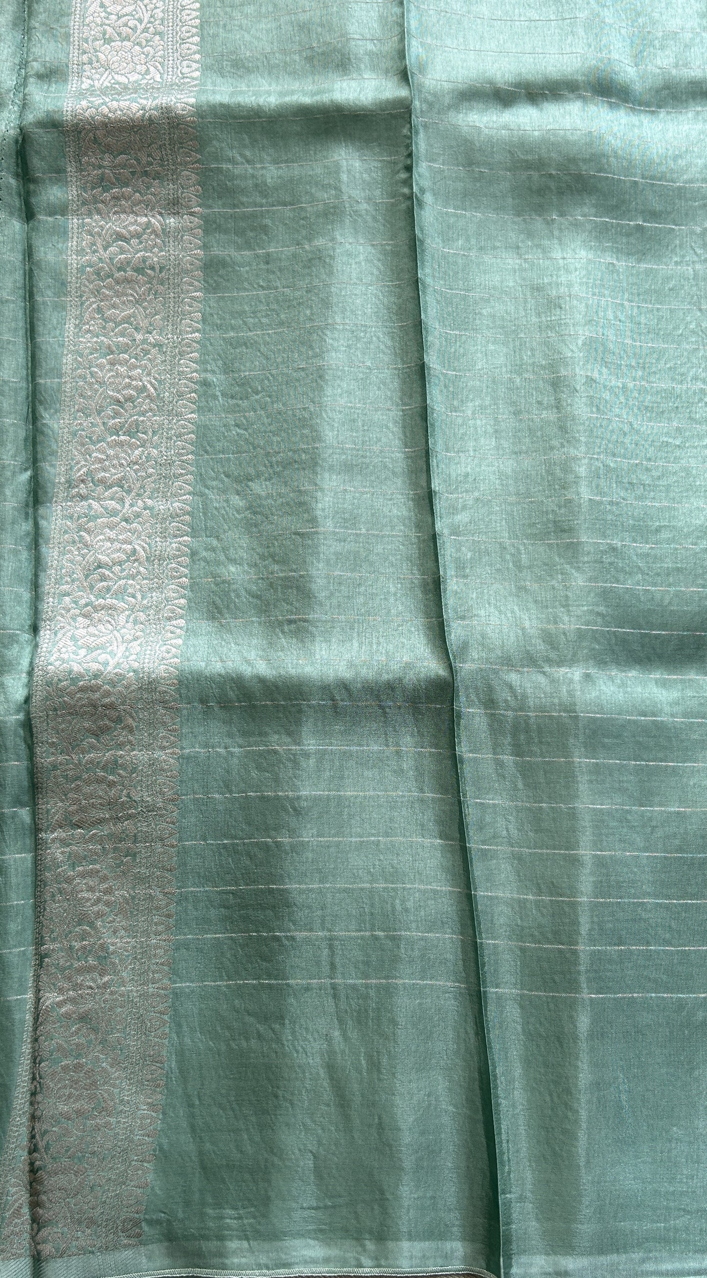 Semi Georgette Saree Sea Green Colored Complemented with a Zari Border. - Sampradaya Designer Studio