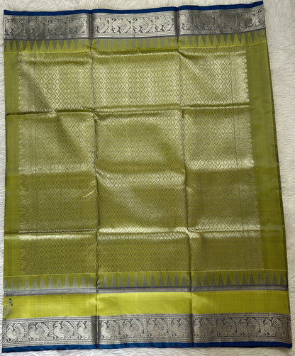 Venkatagiri Pattu Saree Apple Green Colored Complemented With a Pattu Teal Blue Kanchi Border - Sampradaya Designer Studio