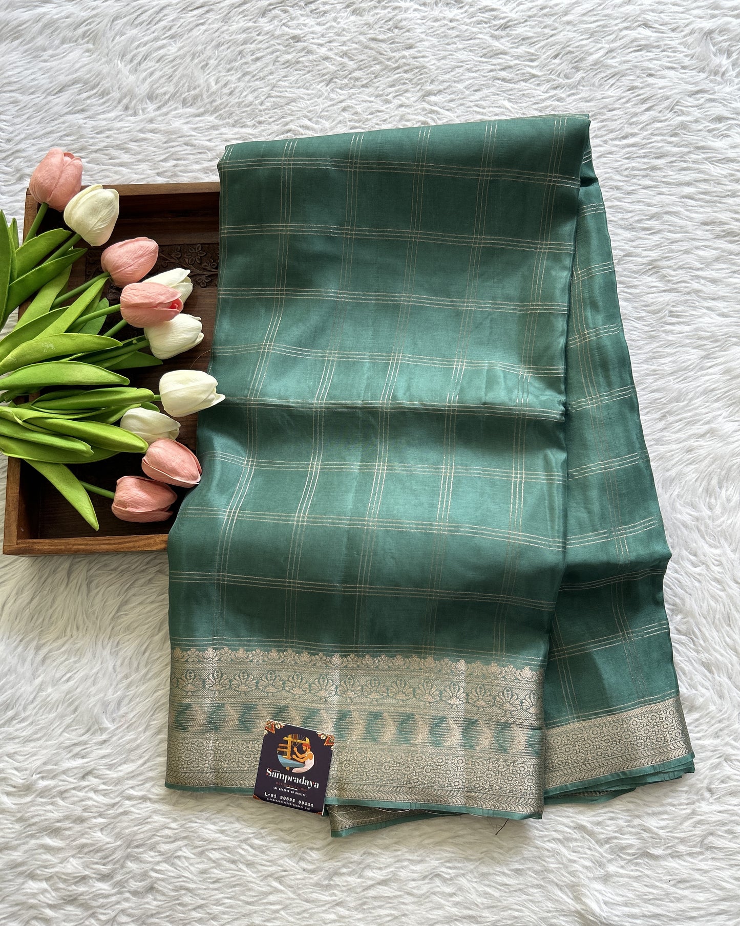 Satin Georgette Saree Sea Blue Colored Complemented with a Zari Border. - Sampradaya Designer Studio