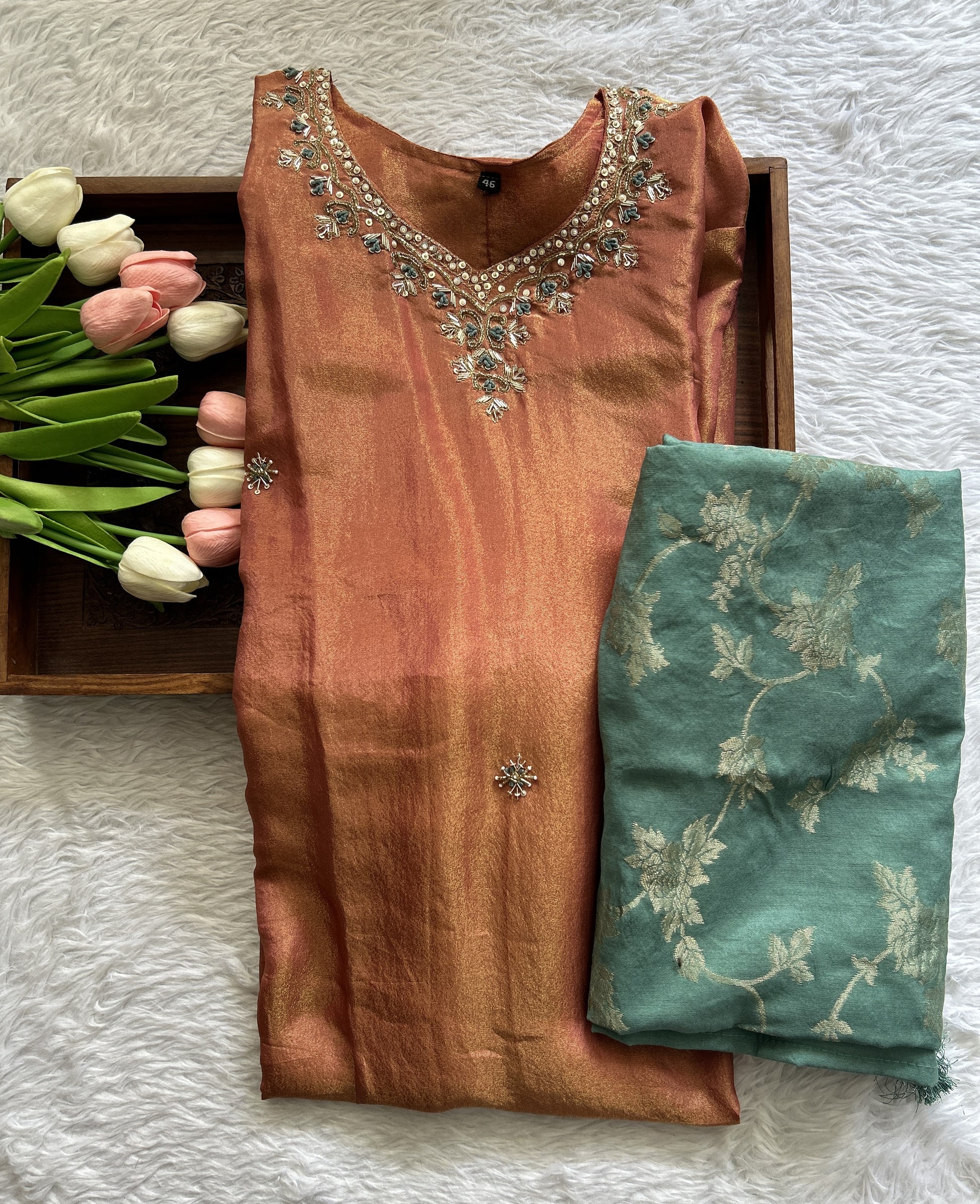 Tissue Kurti Rust Orange Colored With a Embroidery Work . - Sampradaya Designer Studio