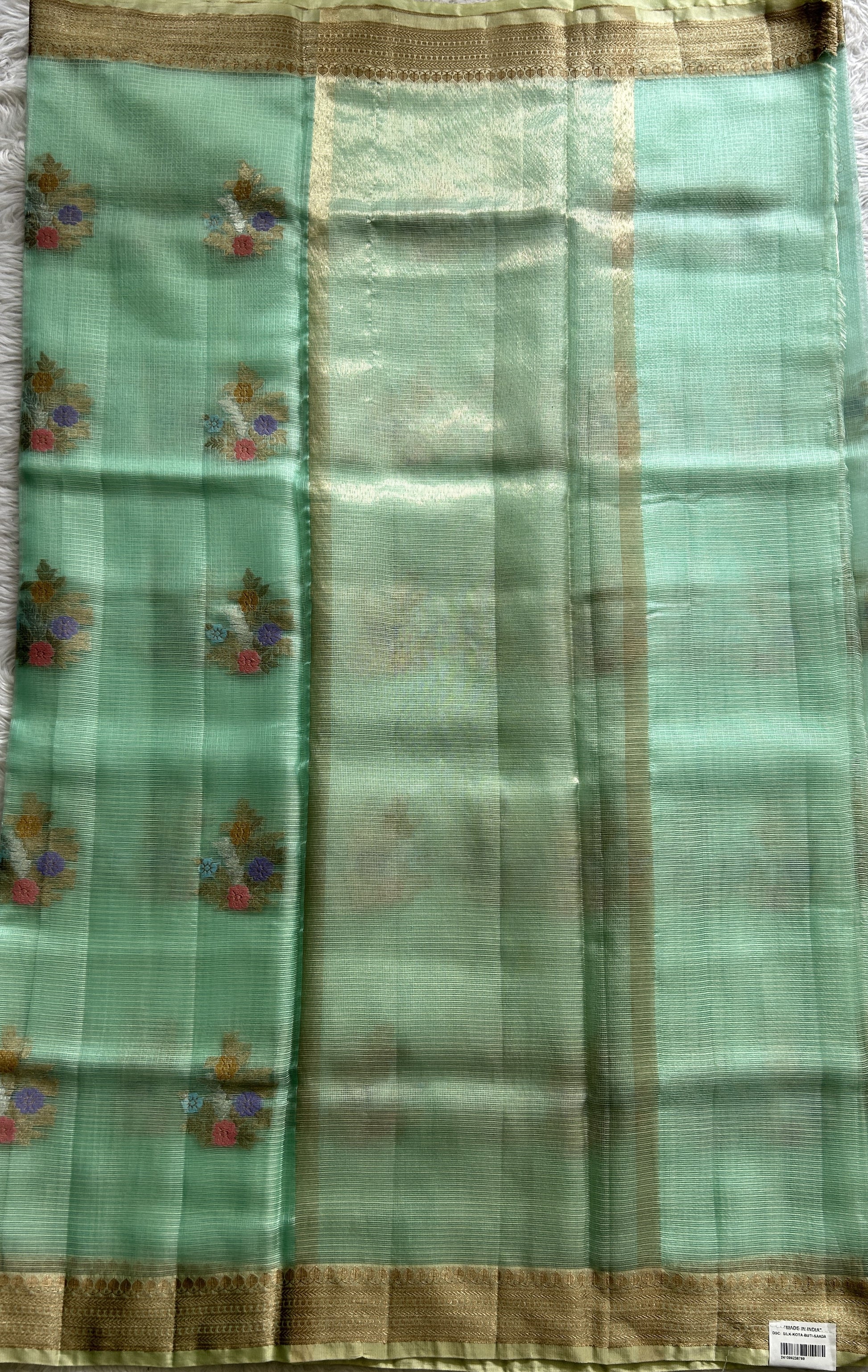 Silk kota Saree Sea Green color complemented with a Zari Border. - Sampradaya Designer Studio