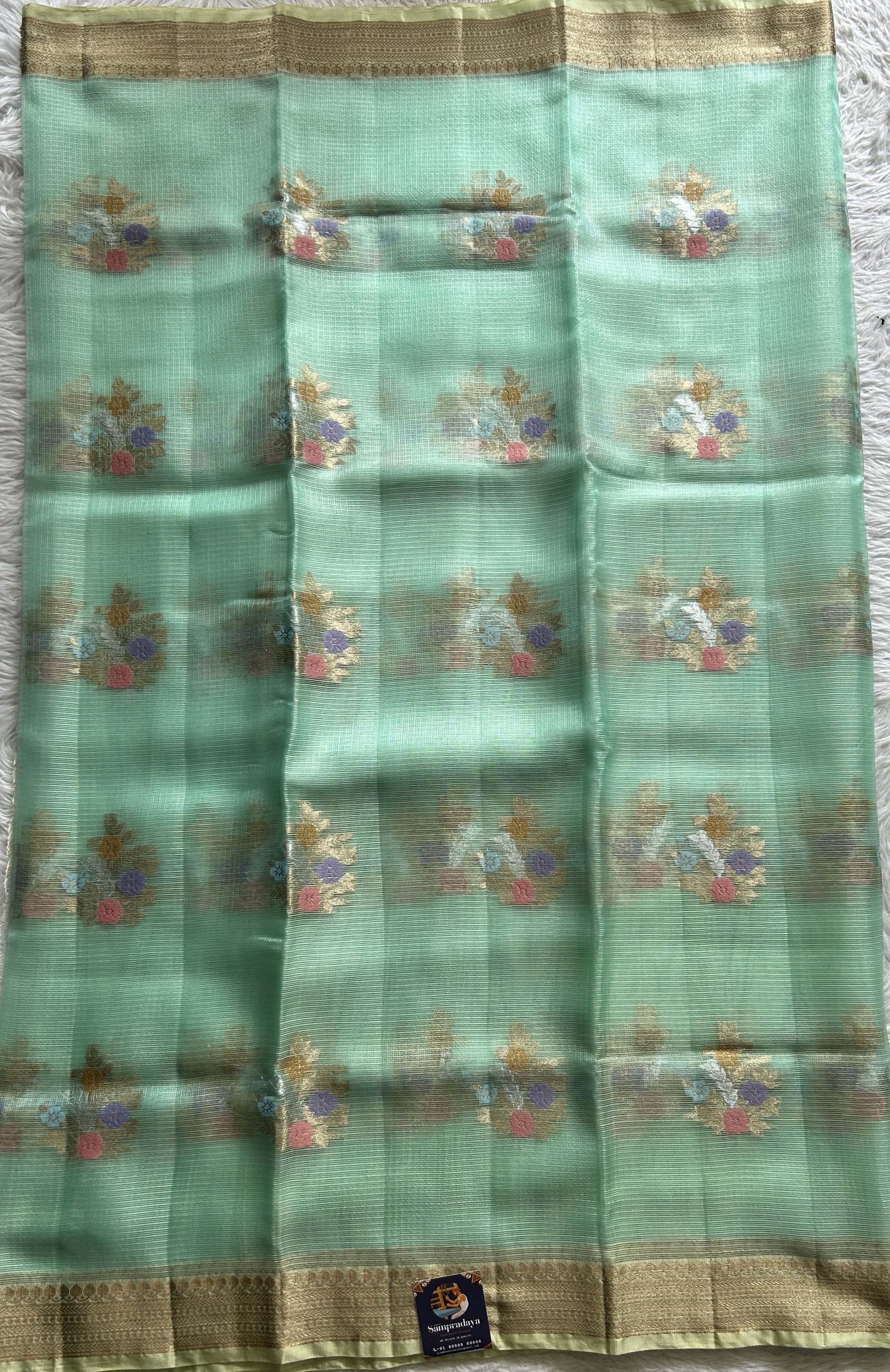 Silk kota Saree Sea Green color complemented with a Zari Border. - Sampradaya Designer Studio