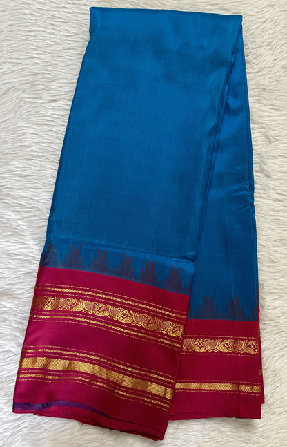 Gadwal Pattu Blue Colored Saree Complemented With a Pattu Pink Color Kanchi Gap Border - Sampradaya Designer Studio