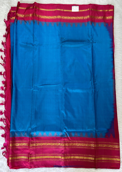 Gadwal Pattu Blue Colored Saree Complemented With a Pattu Pink Color Kanchi Gap Border - Sampradaya Designer Studio