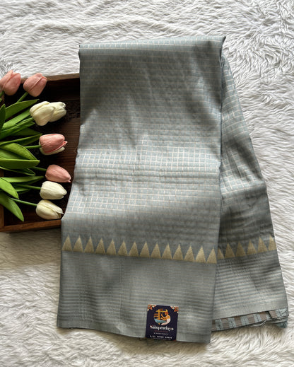 Semi Georgette Saree Gray Colored Complemented with a Zari Border. - Sampradaya Designer Studio