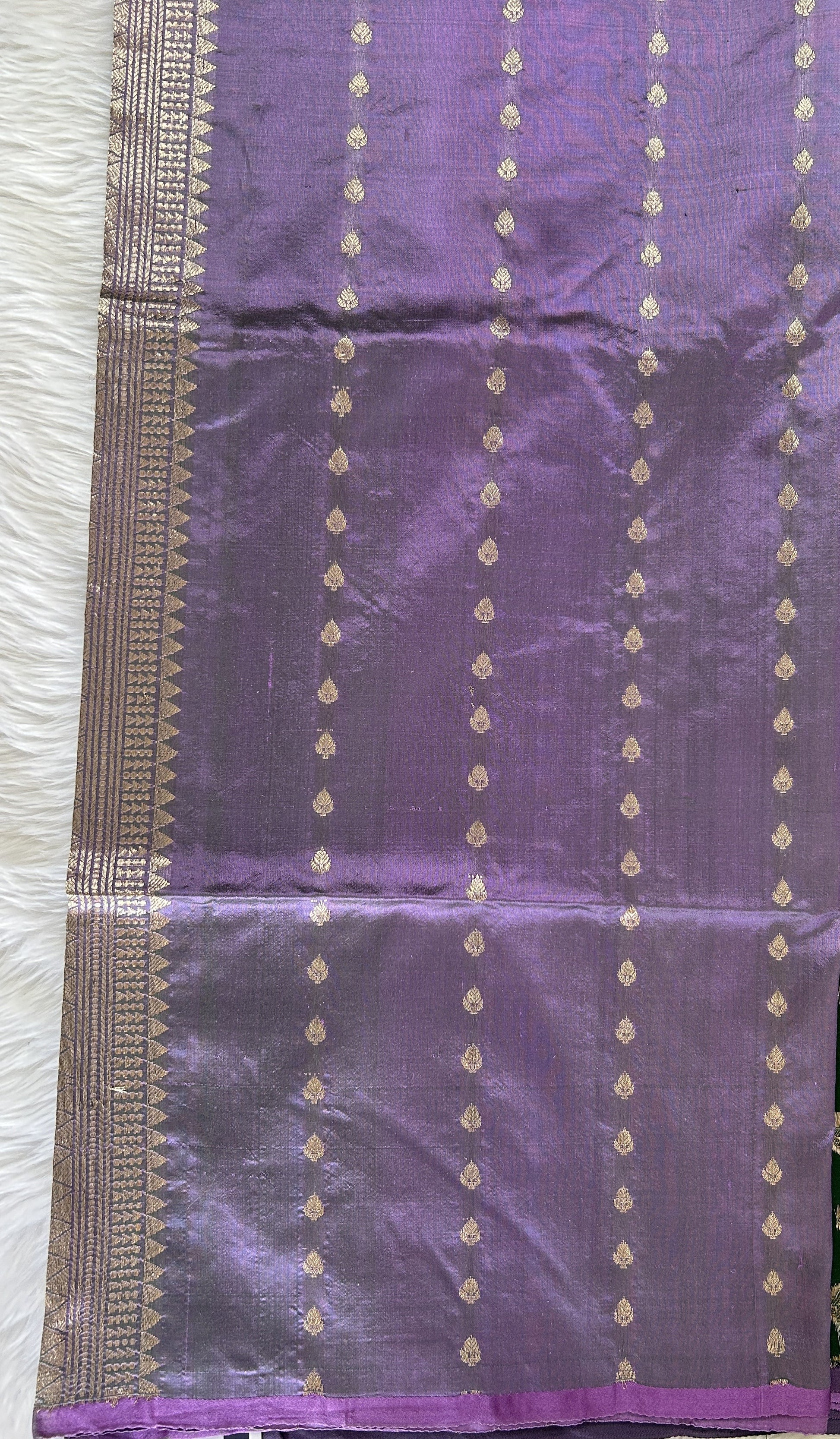 Banarasi Katan Silk Saree Avocado Green colored complemented with a borderless saree. - Sampradaya Designer Studio